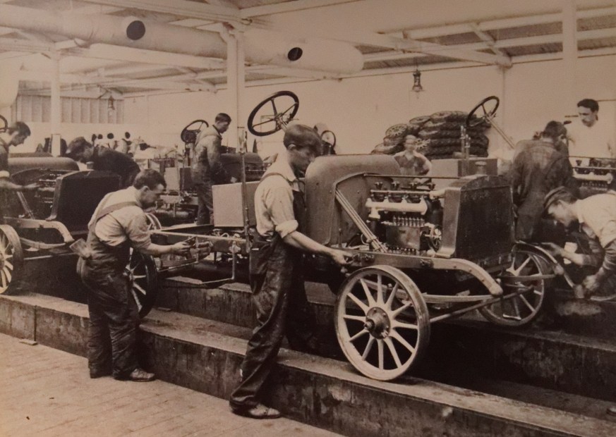 An assembly line was used at the automobile plant.